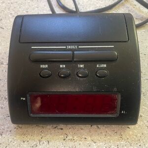 Vintage, old fashioned simple Black Digital Alarm Clock with Red Display